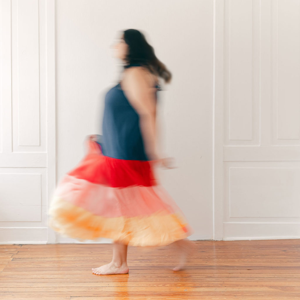 graphic designer walking across studio